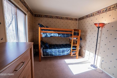 Discover this meticulously maintained contemporary home in the on The Hideout Golf in Pennsylvania - for sale on GolfHomes.com, golf home, golf lot