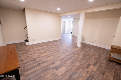 Discover this meticulously maintained contemporary home in the on The Hideout Golf in Pennsylvania - for sale on GolfHomes.com, golf home, golf lot