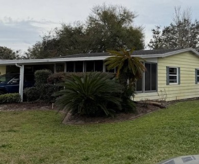 Manufactured Home on Leased Land with Lot Rent. Cute and cozy 2 on Whisperwood Golf Course in Florida - for sale on GolfHomes.com, golf home, golf lot