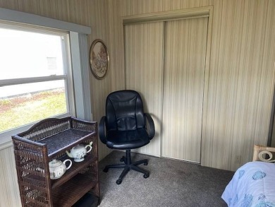 Manufactured Home on Leased Land with Lot Rent. Cute and cozy 2 on Whisperwood Golf Course in Florida - for sale on GolfHomes.com, golf home, golf lot