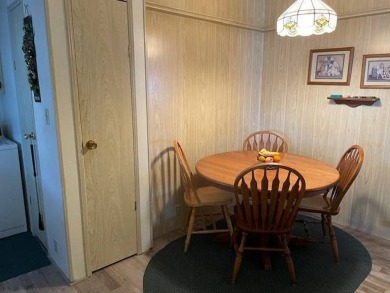 Manufactured Home on Leased Land with Lot Rent. Cute and cozy 2 on Whisperwood Golf Course in Florida - for sale on GolfHomes.com, golf home, golf lot