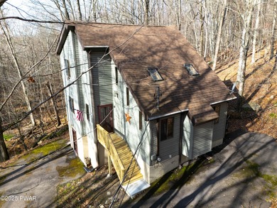 Discover this meticulously maintained contemporary home in the on The Hideout Golf in Pennsylvania - for sale on GolfHomes.com, golf home, golf lot