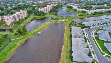 Enjoy the sunrise and sunset from your very own balcony over on Marina Lakes Golf Course in Florida - for sale on GolfHomes.com, golf home, golf lot