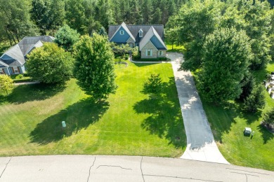 Welcome to your dream home in the serene Village of Hamlet, part on Tullymore Golf Club in Michigan - for sale on GolfHomes.com, golf home, golf lot