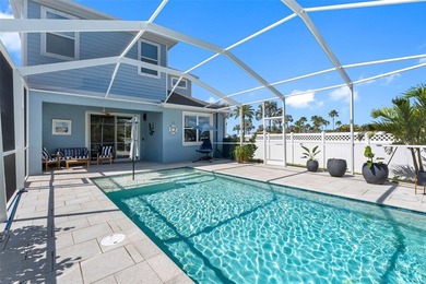 Gorgeous pool home in the gated resort-style community of on Apollo Beach Golf and Sea Club in Florida - for sale on GolfHomes.com, golf home, golf lot
