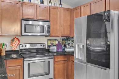 One or more photo(s) have been enhanced or virtually staged on Wedgefield Golf Club in Florida - for sale on GolfHomes.com, golf home, golf lot
