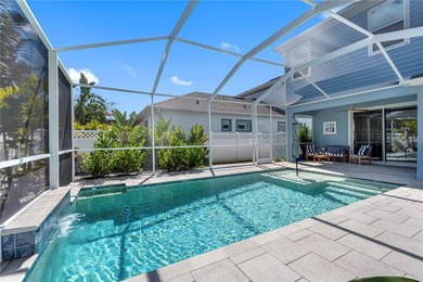 Gorgeous pool home in the gated resort-style community of on Apollo Beach Golf and Sea Club in Florida - for sale on GolfHomes.com, golf home, golf lot
