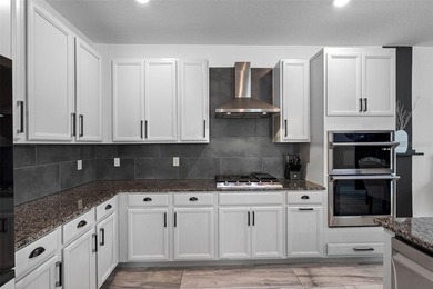 Gorgeous pool home in the gated resort-style community of on Apollo Beach Golf and Sea Club in Florida - for sale on GolfHomes.com, golf home, golf lot