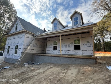 Under construction in Seven Lakes West. This home has it all on Beacon Ridge Golf and Country Club in North Carolina - for sale on GolfHomes.com, golf home, golf lot