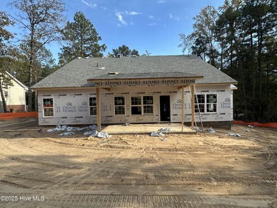 Under construction in Seven Lakes West. This home has it all on Beacon Ridge Golf and Country Club in North Carolina - for sale on GolfHomes.com, golf home, golf lot