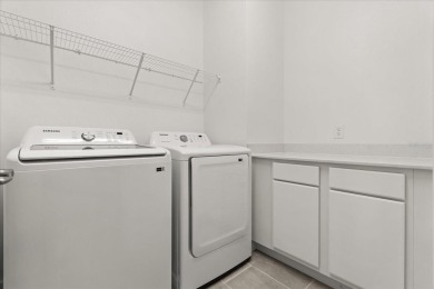 Stunning Key West Style Home that Blends Modern Luxury with on Reunion Resort Golf Course in Florida - for sale on GolfHomes.com, golf home, golf lot