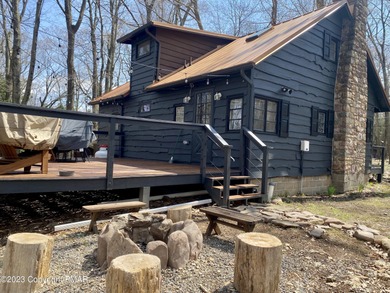 Tucked into the woods of Split Rock and just a short walk to on Split Rock Resort and Country Club in Pennsylvania - for sale on GolfHomes.com, golf home, golf lot