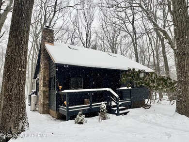 Tucked into the woods of Split Rock and just a short walk to on Split Rock Resort and Country Club in Pennsylvania - for sale on GolfHomes.com, golf home, golf lot