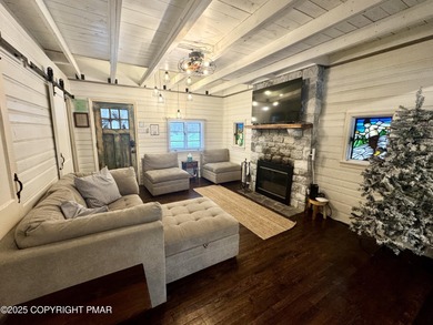 Tucked into the woods of Split Rock and just a short walk to on Split Rock Resort and Country Club in Pennsylvania - for sale on GolfHomes.com, golf home, golf lot