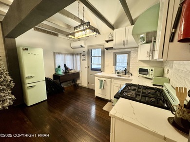 Tucked into the woods of Split Rock and just a short walk to on Split Rock Resort and Country Club in Pennsylvania - for sale on GolfHomes.com, golf home, golf lot