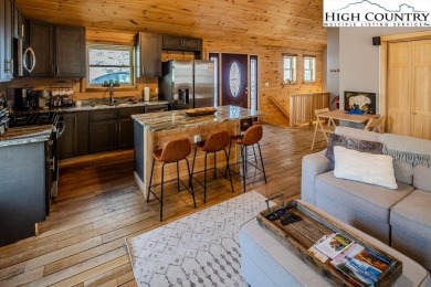 This charming Creekside cabin offers the perfect blend of on Beech Mountain Club in North Carolina - for sale on GolfHomes.com, golf home, golf lot