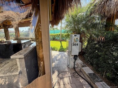 A SPORT LOVER'S DREAM WITH PRIVACY AND COMFORT! Perfectly on St. Lucie Trail Golf Club in Florida - for sale on GolfHomes.com, golf home, golf lot