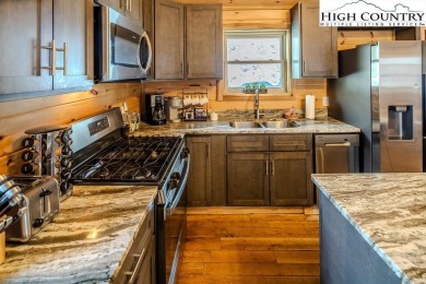 This charming Creekside cabin offers the perfect blend of on Beech Mountain Club in North Carolina - for sale on GolfHomes.com, golf home, golf lot