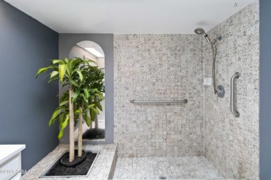 Welcome to maintenance-free living in the heart of Pelican Bay on The Club At Pelican Bay - North Course in Florida - for sale on GolfHomes.com, golf home, golf lot