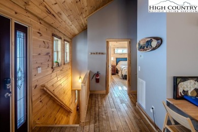 This charming Creekside cabin offers the perfect blend of on Beech Mountain Club in North Carolina - for sale on GolfHomes.com, golf home, golf lot