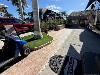 A SPORT LOVER'S DREAM WITH PRIVACY AND COMFORT! Perfectly on St. Lucie Trail Golf Club in Florida - for sale on GolfHomes.com, golf home, golf lot