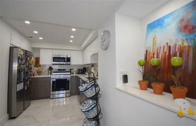 Beautifully updated 2 bed / 2 bath condo with serene water and on  in Florida - for sale on GolfHomes.com, golf home, golf lot