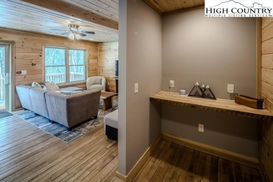 This charming Creekside cabin offers the perfect blend of on Beech Mountain Club in North Carolina - for sale on GolfHomes.com, golf home, golf lot