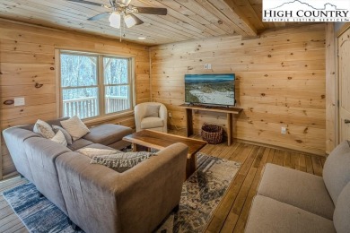 This charming Creekside cabin offers the perfect blend of on Beech Mountain Club in North Carolina - for sale on GolfHomes.com, golf home, golf lot