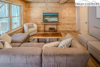 This charming Creekside cabin offers the perfect blend of on Beech Mountain Club in North Carolina - for sale on GolfHomes.com, golf home, golf lot