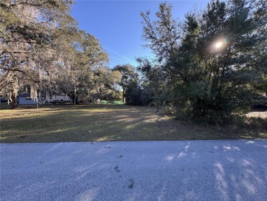 Fantastic .47-acre lot located in a peaceful, private Rainbows on Rainbows End Golf Club in Florida - for sale on GolfHomes.com, golf home, golf lot