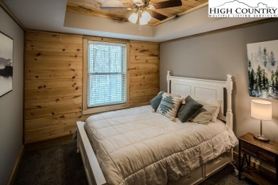 This charming Creekside cabin offers the perfect blend of on Beech Mountain Club in North Carolina - for sale on GolfHomes.com, golf home, golf lot