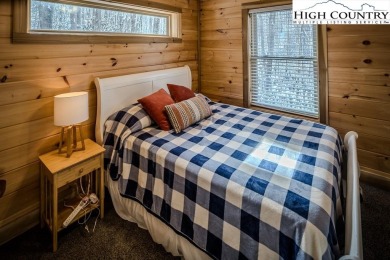 This charming Creekside cabin offers the perfect blend of on Beech Mountain Club in North Carolina - for sale on GolfHomes.com, golf home, golf lot