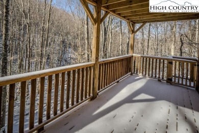 This charming Creekside cabin offers the perfect blend of on Beech Mountain Club in North Carolina - for sale on GolfHomes.com, golf home, golf lot