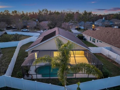 Darling POOL home with the PERFECT layout! Located in the on Hunters Green Country Club in Florida - for sale on GolfHomes.com, golf home, golf lot