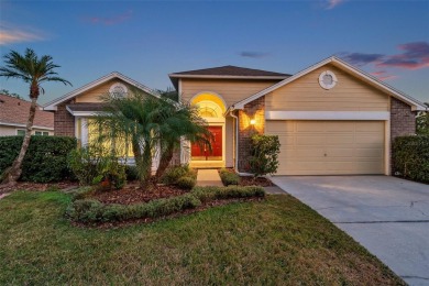 Darling POOL home with the PERFECT layout! Located in the on Hunters Green Country Club in Florida - for sale on GolfHomes.com, golf home, golf lot