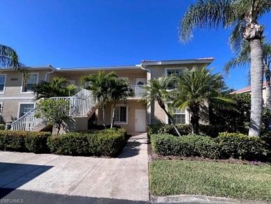 GOLF INCLUDED with this bright end unit condo in Cypress Woods on Cypress Woods Golf and Country Club in Florida - for sale on GolfHomes.com, golf home, golf lot