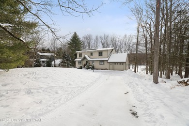 Welcome to a true turn-key, Lake Front, fully furnished home on on Paupack Hills Golf and Country Club in Pennsylvania - for sale on GolfHomes.com, golf home, golf lot