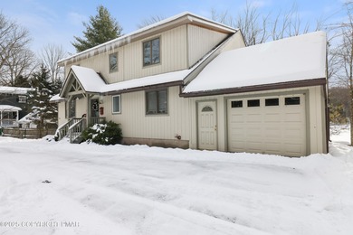 Welcome to a true turn-key, Lake Front, fully furnished home on on Paupack Hills Golf and Country Club in Pennsylvania - for sale on GolfHomes.com, golf home, golf lot