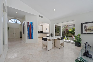 Enjoy the best of Wellington living this season in this on Palm Beach Polo and Country Club in Florida - for sale on GolfHomes.com, golf home, golf lot