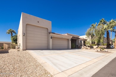 Take a look at this stunning RV garage home located in a private on London Bridge Golf Course in Arizona - for sale on GolfHomes.com, golf home, golf lot