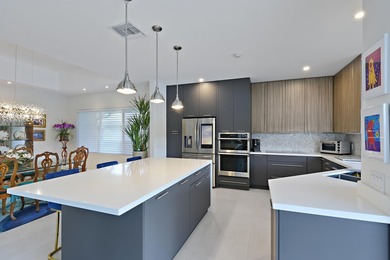 This elegantly remodeled contemporary pool home is located in on Boca Grove Golf and Tennis in Florida - for sale on GolfHomes.com, golf home, golf lot