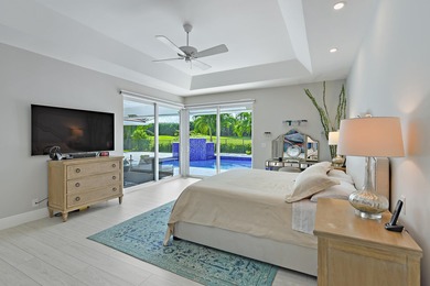 This elegantly remodeled contemporary pool home is located in on Boca Grove Golf and Tennis in Florida - for sale on GolfHomes.com, golf home, golf lot