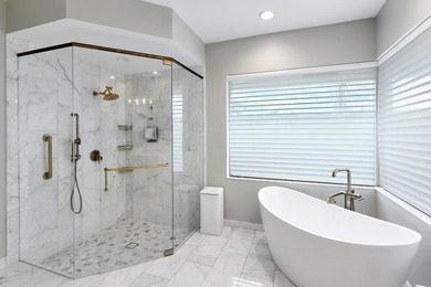 This elegantly remodeled contemporary pool home is located in on Boca Grove Golf and Tennis in Florida - for sale on GolfHomes.com, golf home, golf lot