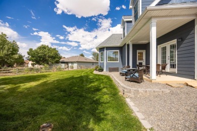 This stunning residence in the sought-after Cobble Creek Golf on Links At Cobble Creek in Colorado - for sale on GolfHomes.com, golf home, golf lot