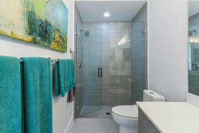 This elegantly remodeled contemporary pool home is located in on Boca Grove Golf and Tennis in Florida - for sale on GolfHomes.com, golf home, golf lot