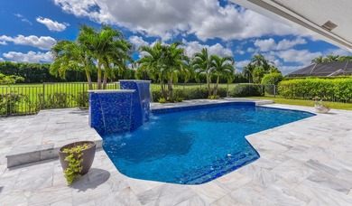 This elegantly remodeled contemporary pool home is located in on Boca Grove Golf and Tennis in Florida - for sale on GolfHomes.com, golf home, golf lot