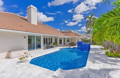 This elegantly remodeled contemporary pool home is located in on Boca Grove Golf and Tennis in Florida - for sale on GolfHomes.com, golf home, golf lot