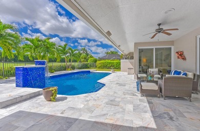 This elegantly remodeled contemporary pool home is located in on Boca Grove Golf and Tennis in Florida - for sale on GolfHomes.com, golf home, golf lot