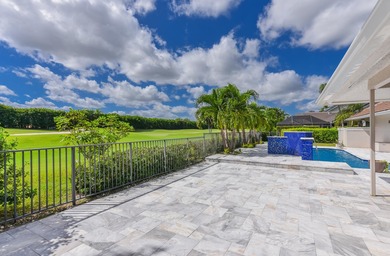This elegantly remodeled contemporary pool home is located in on Boca Grove Golf and Tennis in Florida - for sale on GolfHomes.com, golf home, golf lot