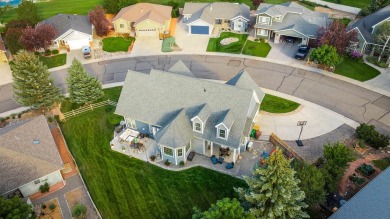 This stunning residence in the sought-after Cobble Creek Golf on Links At Cobble Creek in Colorado - for sale on GolfHomes.com, golf home, golf lot